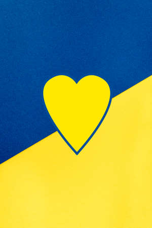 Wallpaper diagonal background with the shape of a heart in the national colors of Ukraine, blue and...