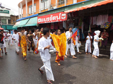 Nakhon si thammarat, Thailand - October 20, 2012 - Unidentified Thai men to be incarcerated with spirits in Chinese Vegetarian Festival parade on October 20, 2012 in Nakhon si thammarat, Thailand.のeditorial素材