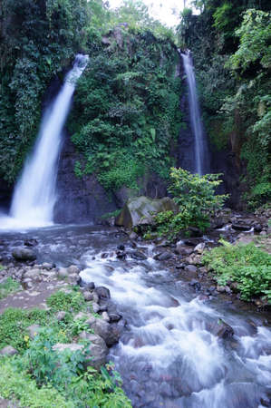 Tirto Pengantin Waterfall is one of the natural tourism destinations in Banyuwangi Regency, the source of water from this waterfall is from Raung Mountain.の写真素材