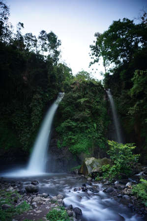 Tirto Pengantin Waterfall is one of the natural tourism destinations in Banyuwangi Regency, the source of water from this waterfall is from Raung Mountain.の写真素材