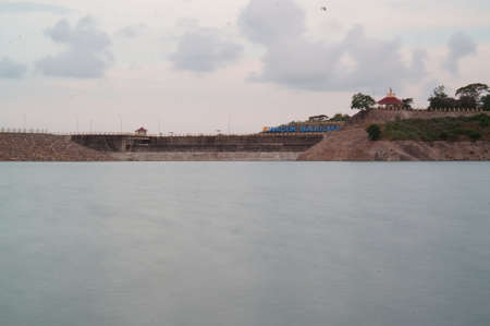 Reservoir is an artificial lake used as a river dam that aims to store water.の写真素材