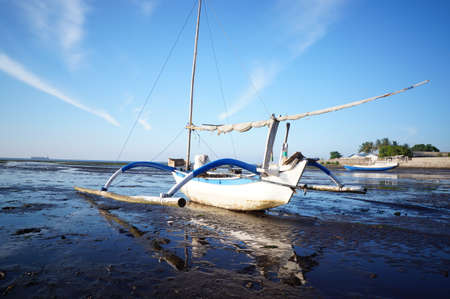 fishing boats are in transit on the coastの写真素材