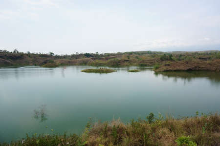 Reservoir is an artificial lake used as a river dam that aims to store water.の写真素材