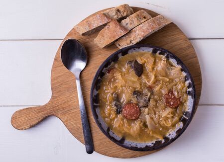 Slovak national christmas cabbage soup kapustnica with mushrooms on white background.の写真素材