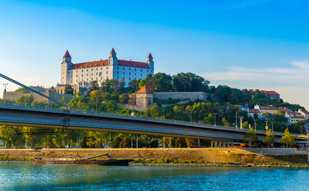 Bratislava castle over Danube river with new bridge in foreground.のeditorial素材