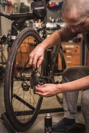 Road bicycle maintenance in service center.の写真素材
