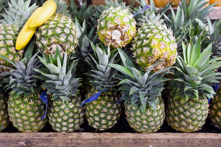 Pineapples in foodstoreの写真素材