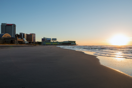 Atlantic City skylines, dunes and ocean shore at sunriseのeditorial素材