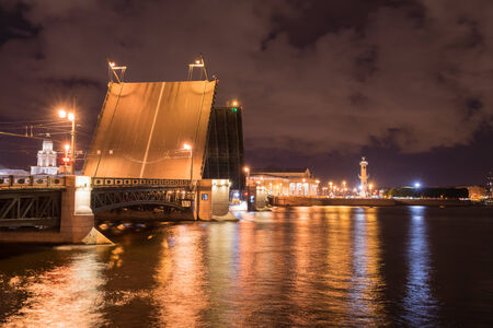 Open drawbridge at night in St. Petersburg Russiaの写真素材