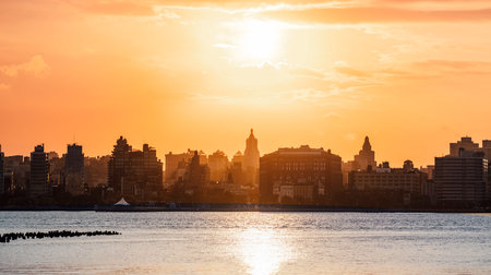 sunrise over the river views Manhattan new York sunの写真素材