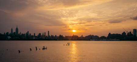 sunrise over the river sun new Yorkの写真素材