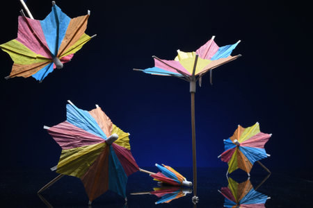 Different miniature paper cocktail umbrellasの写真素材