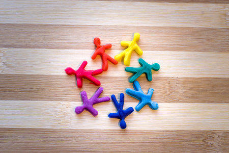 Rainbow colored men made of plasticine. The concept of LGBTの写真素材