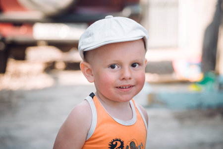 Portrait of smiling little boy looking to cameraの写真素材