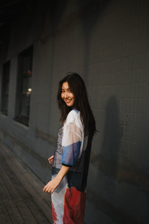 Girl in a dress in the cityの写真素材