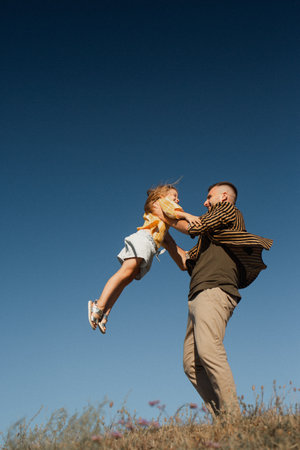Father and daughter play togetherの写真素材