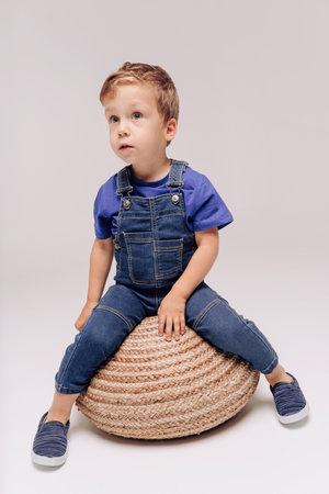 boy of 4 wearing blue t-shirtの写真素材