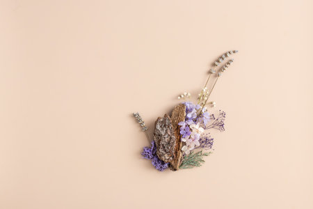 Background for cosmetic branding with mossy wood  lavender  flowers .の写真素材