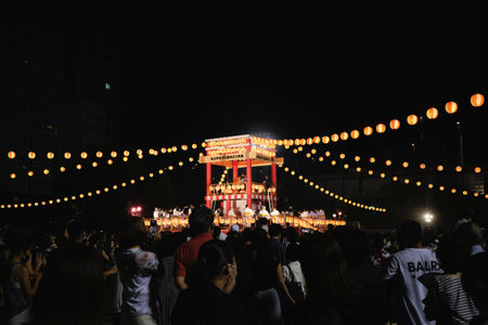 Visitors at a local summer festival at night in Tokyo, Japanのeditorial素材