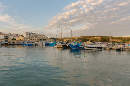 Eyed colorful boats Luzzu in the Harbor village Marsaxlokk, Maltaのeditorial素材