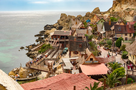 View of the famous village Popeye and bay on a sunny day. Anchorのeditorial素材