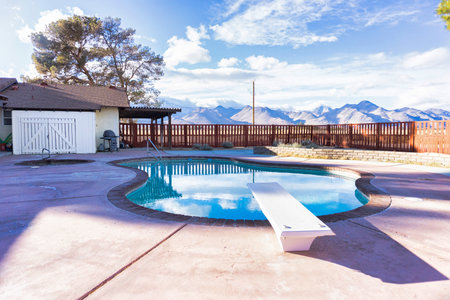 Outdoor pool next to home in desertのeditorial素材