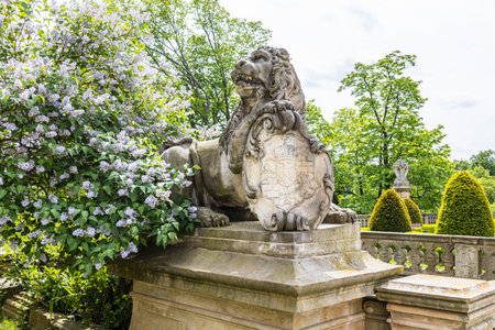 Stone lion statue with a coat of arms near the Ksiaz Castleのeditorial素材