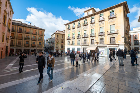 People on the street of the tourist city of Granada, Spain.のeditorial素材