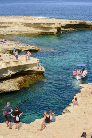 MPeople are enjoying sunny day at Saint Peter's pool , Maltaのeditorial素材