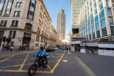 Bike delivery man in the financial center of Londonのeditorial素材