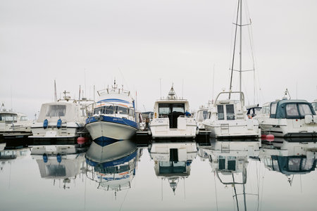 Moored boats floating on clear riverのeditorial素材