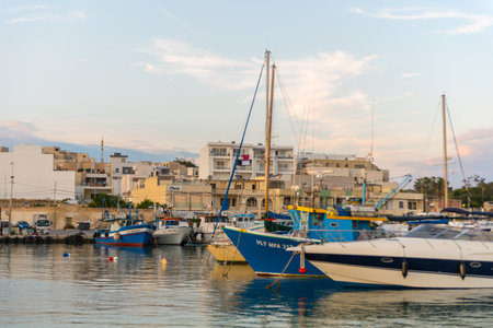 Eyed colorful boats Luzzu in the Harbor village Marsaxlokk, Maltaのeditorial素材