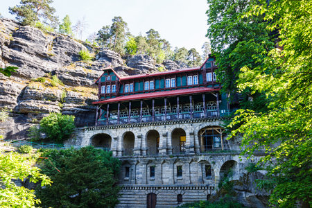 House between rocks near Pravcicka Gateのeditorial素材