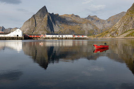 Red boat in Hamnoy with mountains for background, Lofoten Islandsのeditorial素材