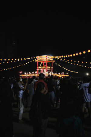 Visitors at a local summer festival at night in Tokyo, Japanのeditorial素材