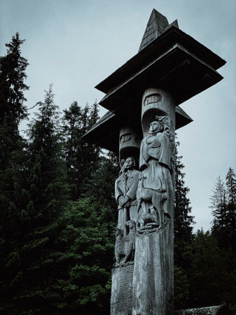 Wooden statue on Syneyir lake in Carpathians mountainssのeditorial素材