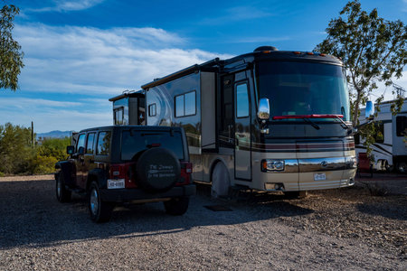 The famous off-road vehicle side by side with a motorhome in Tucのeditorial素材