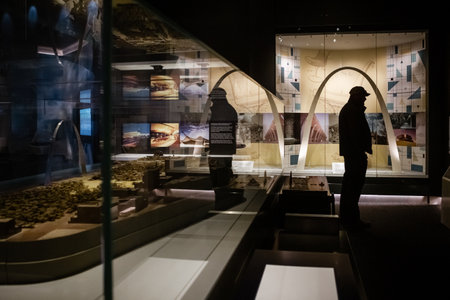 Man viewing exhibit in Gateway Arch museumのeditorial素材