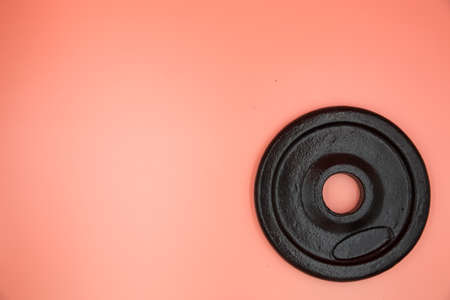 Plates dumbbell background pinkの写真素材