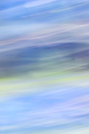 Blurred abstract background.Misty sky concept. Blues and soft pastel colours.の写真素材