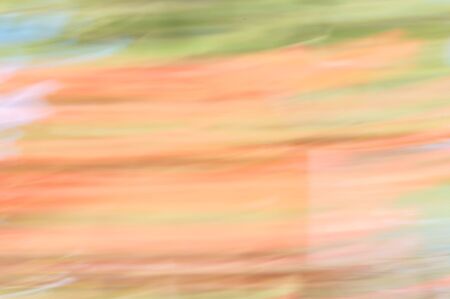 Blurred abstract background. Warm multicolored stripes.の写真素材