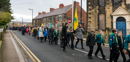 WREXHAM, UK - NOVEMBER 13, 2016: The Remembrance Parade along Coedpoeth High Street. An annual parade from St Tydfil church to the War memorial on Remembrance Sunday, also known as Poppy Day.のeditorial素材