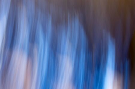 Blurred abstract background. Turquoise blue flaming fantasy lights.の写真素材