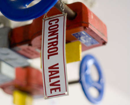 shallow depth of field image of a water pipe valveの写真素材