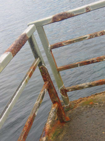 bars at a pier overlooking pacific oceanの写真素材
