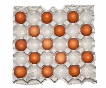 The Large tray of fresh eggs isolated on white background