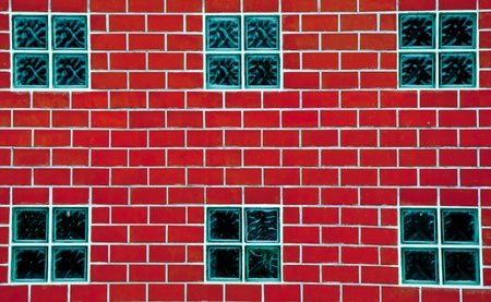 The Glass block on red brick wallの写真素材