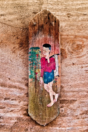 The Old painting on wood isolated on wood backgroundのeditorial素材