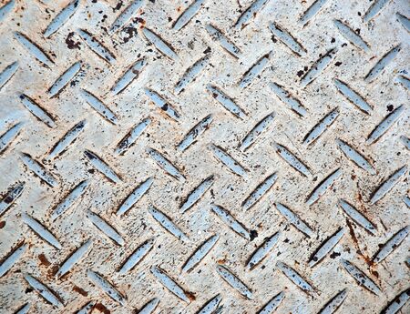 The Grunge steel floor plate background textureの写真素材