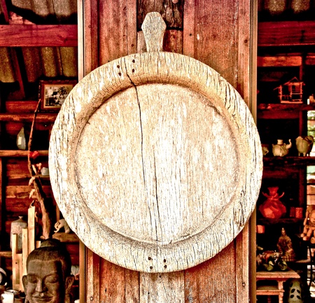 The Old wooden circle frame on wood pole backgroundのeditorial素材